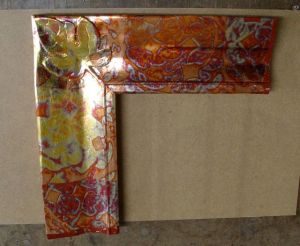 Vertical leg is back side of leaf