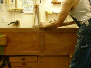 Adjusting strike edge of door